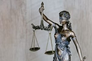 A statue of Lady Justice holding scales